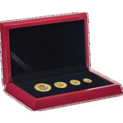 Vier Goldmünzen mit Queen-Porträts in einem Kästchen