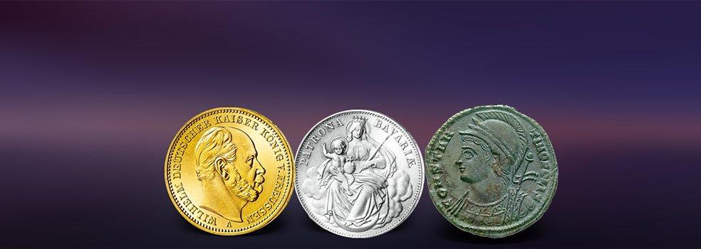 Drei echte historische Münzen auf einem Bild