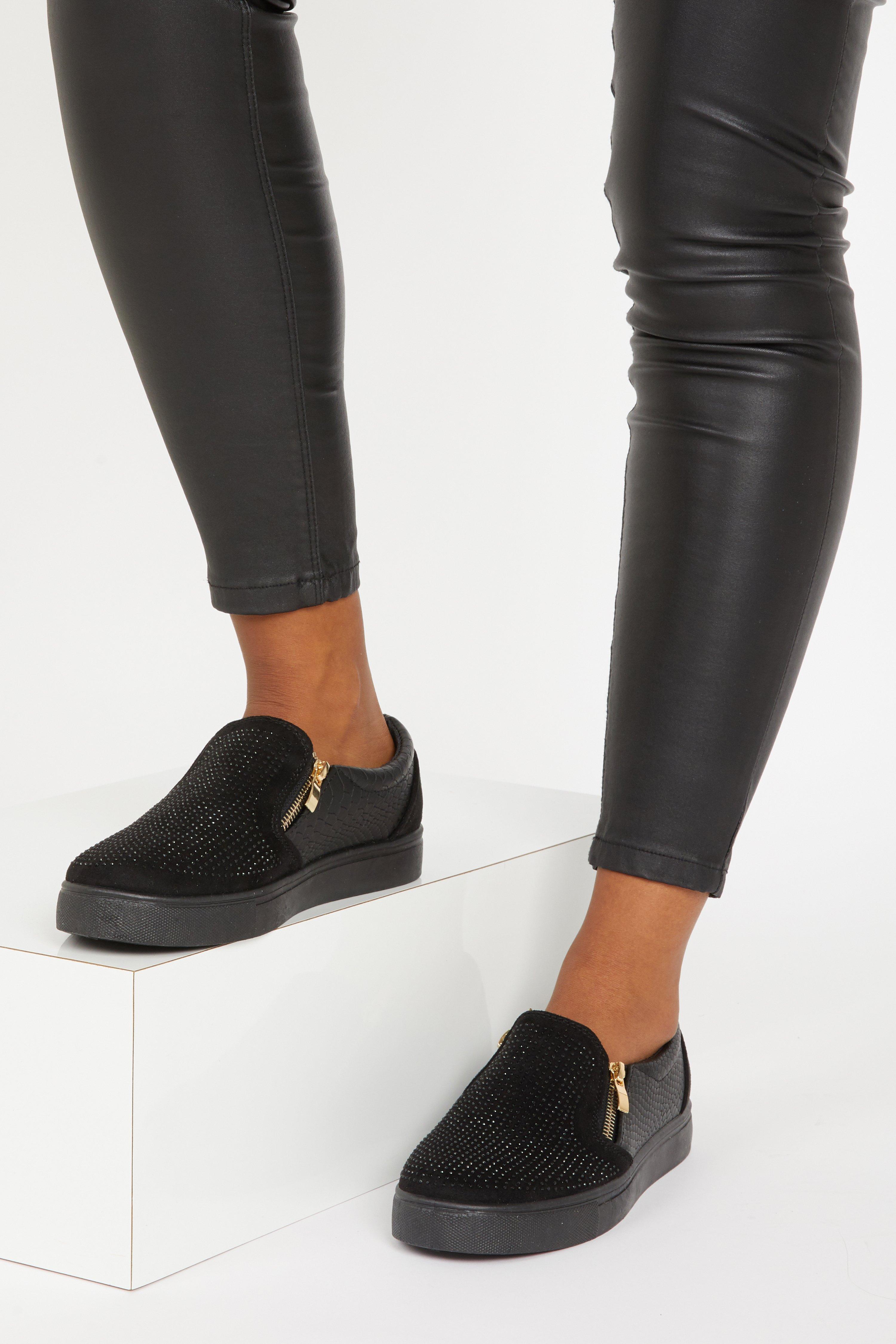 black zip trainers
