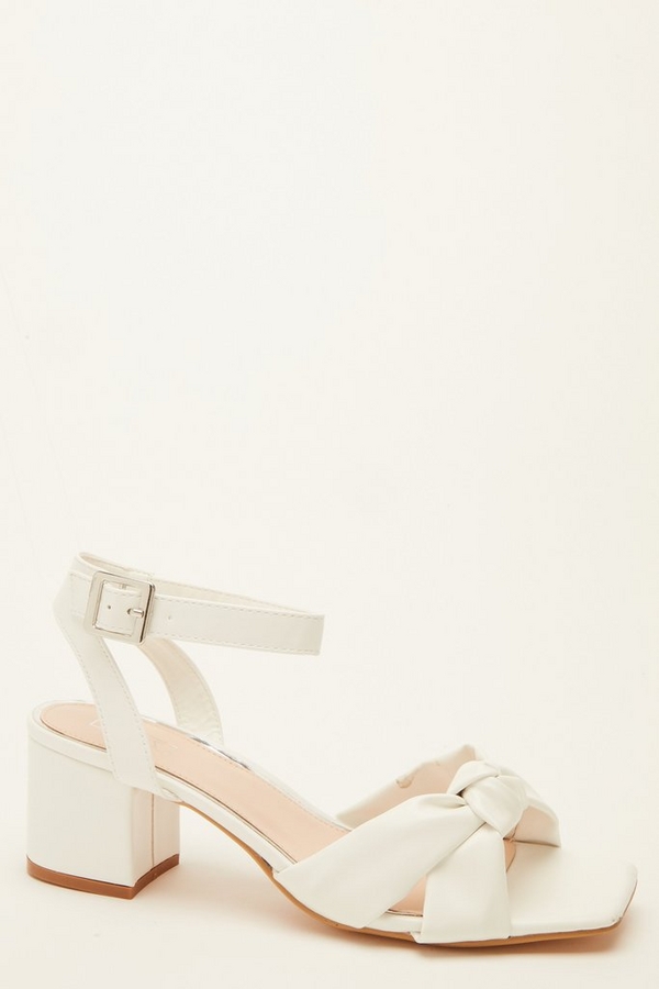 white pointed toe flats with ankle strap