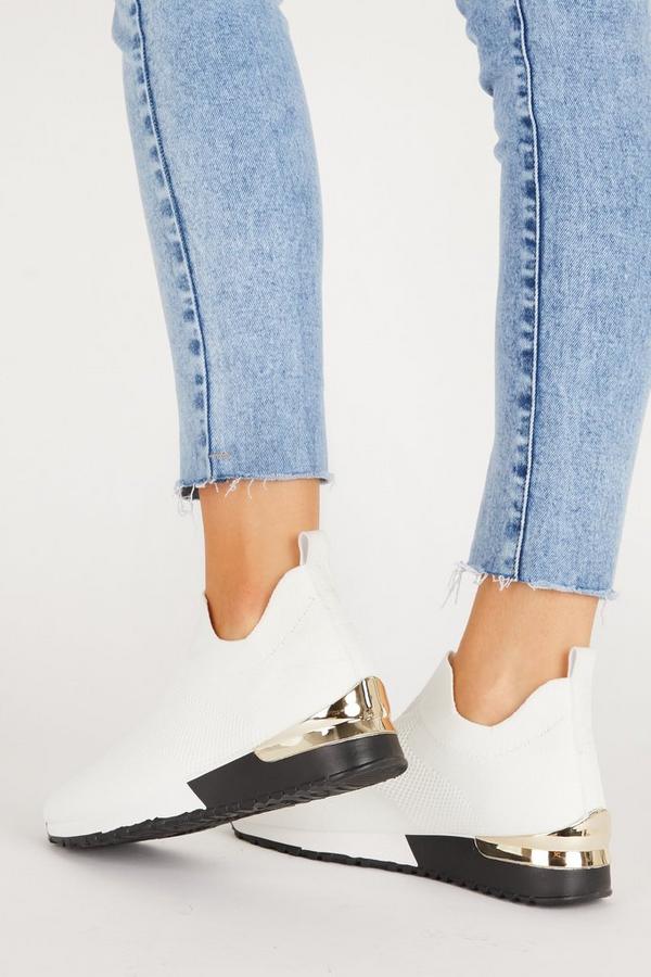 white knitted slip on trainers