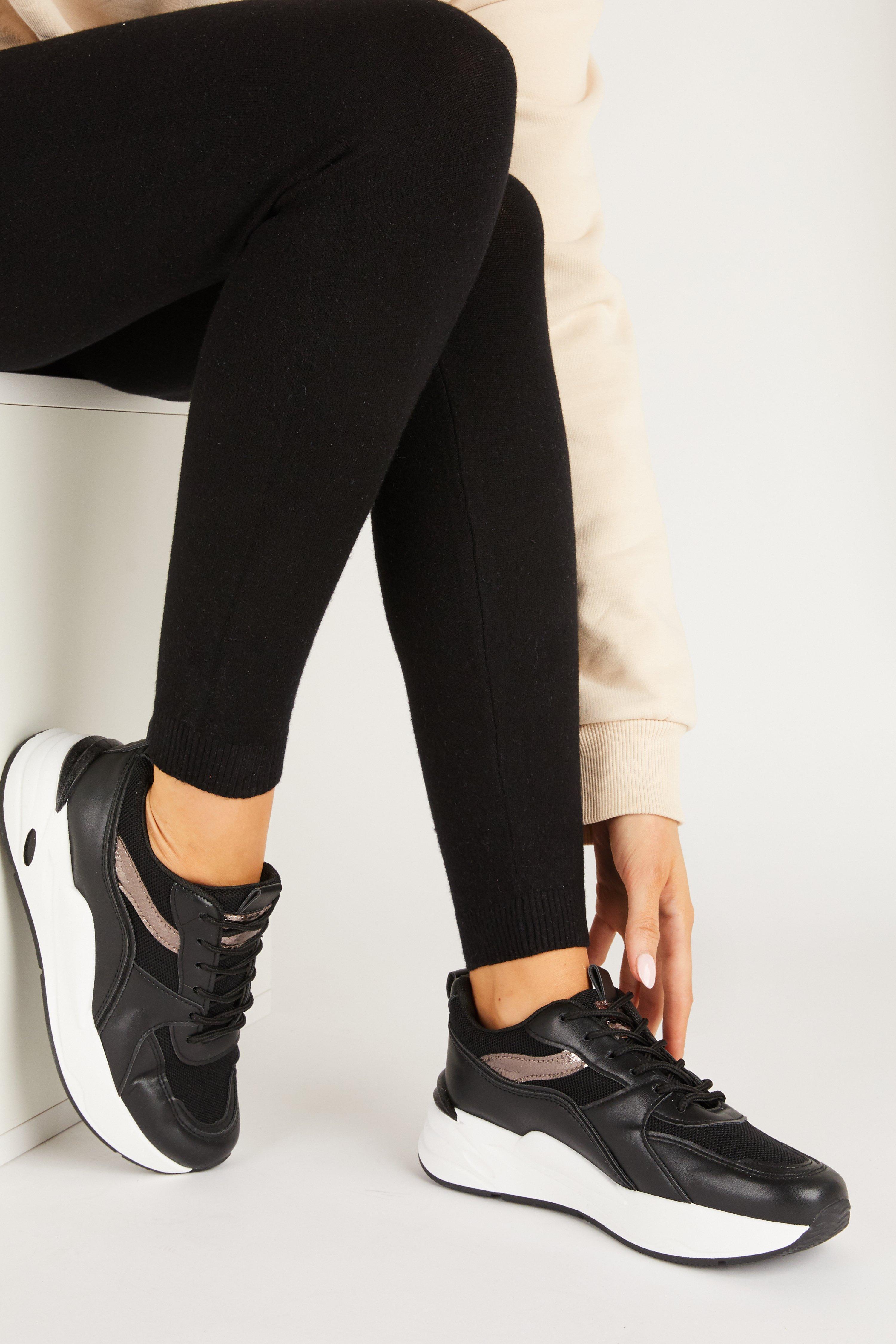black bulky trainers