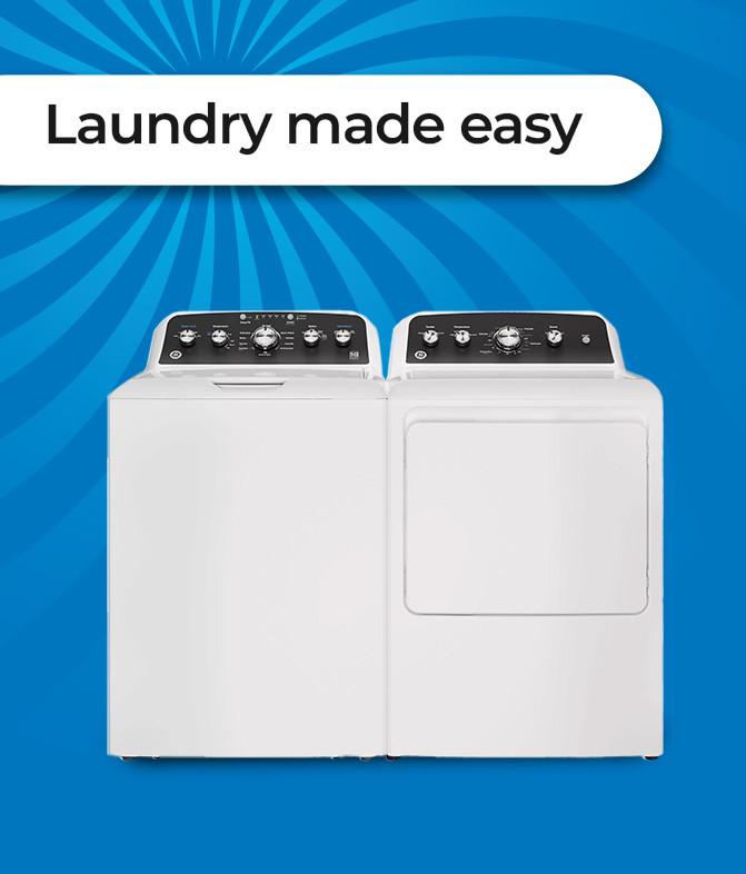 Washer with laundry detergent and towels.