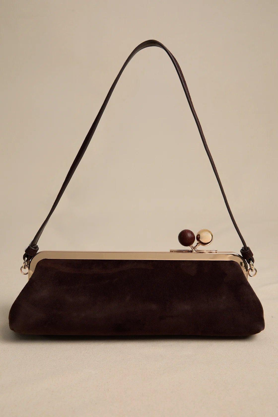 long suede shoulder bag with lock closure