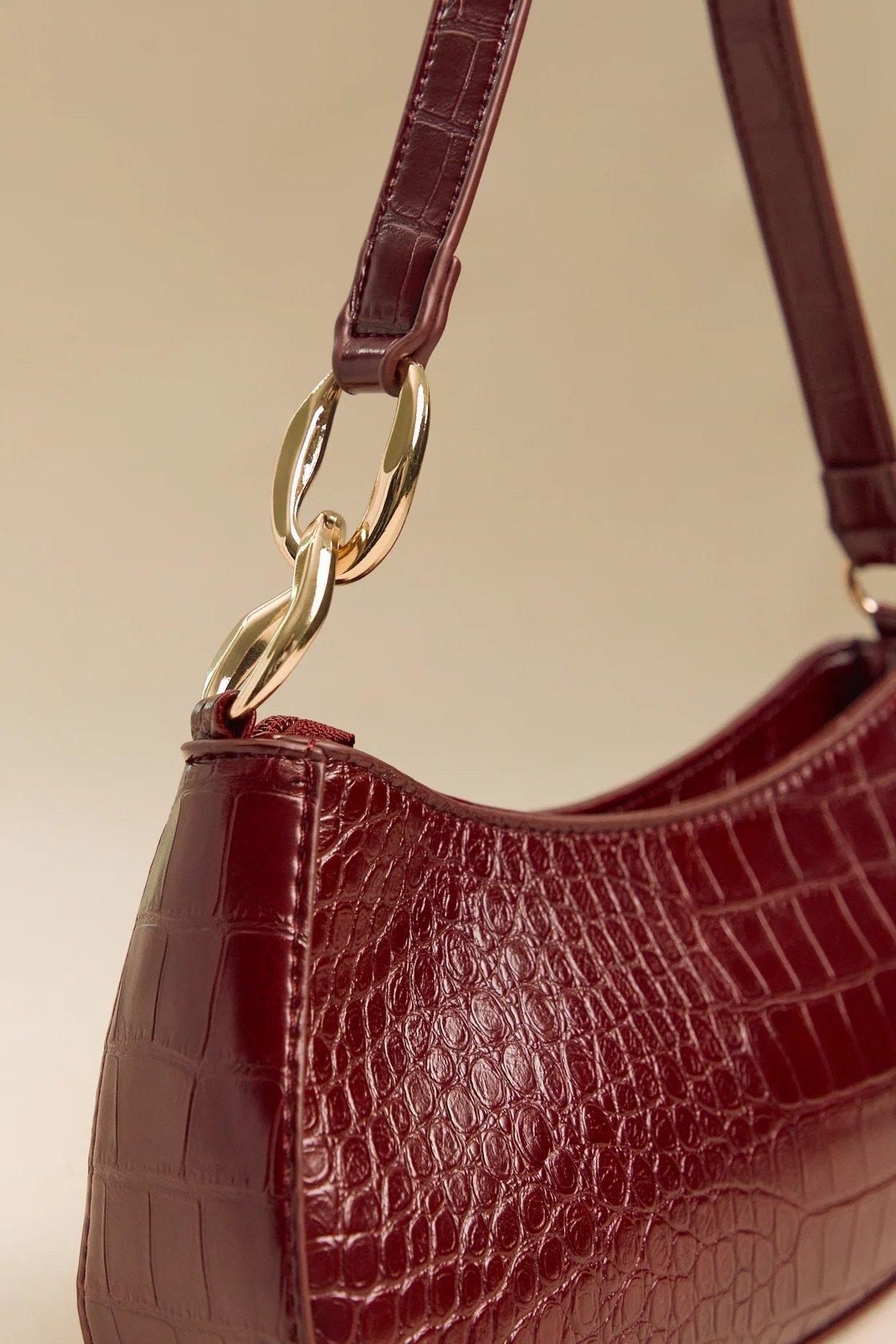 red crocodile embossed shoulder bag