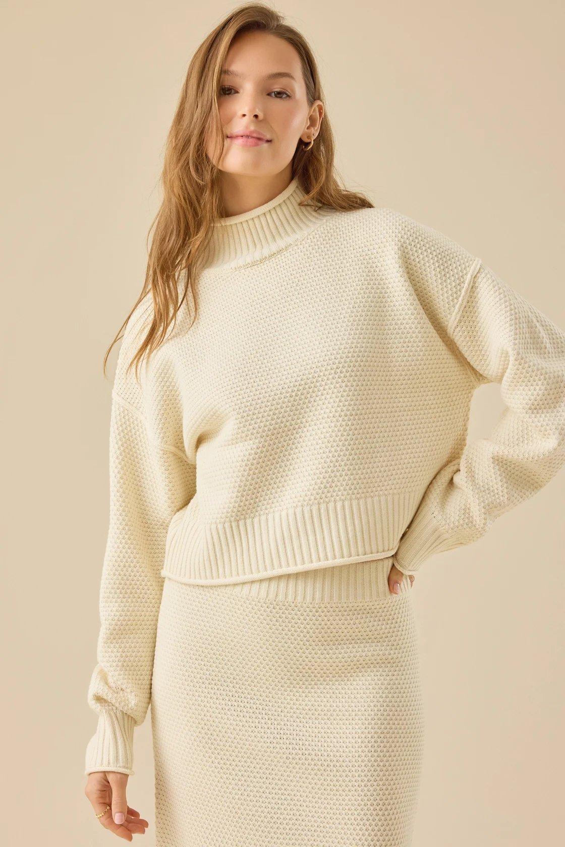 cream mock neck sweater