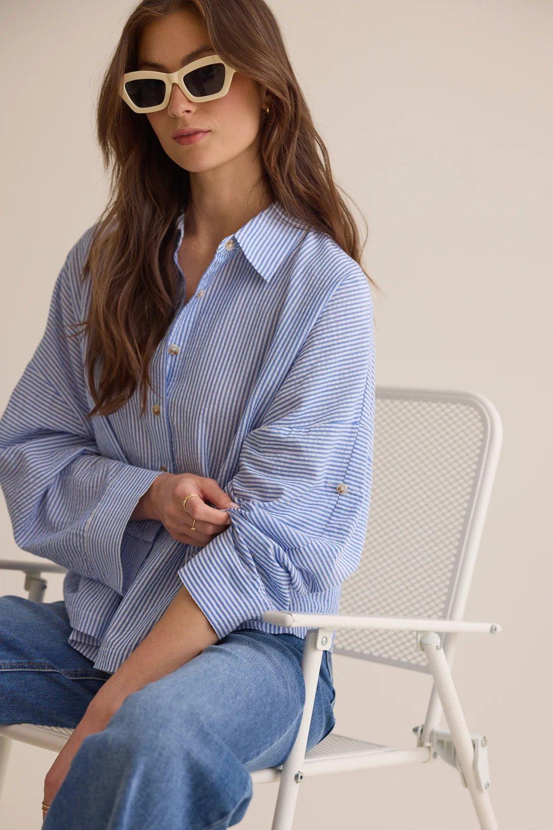 blue and white striped button up top