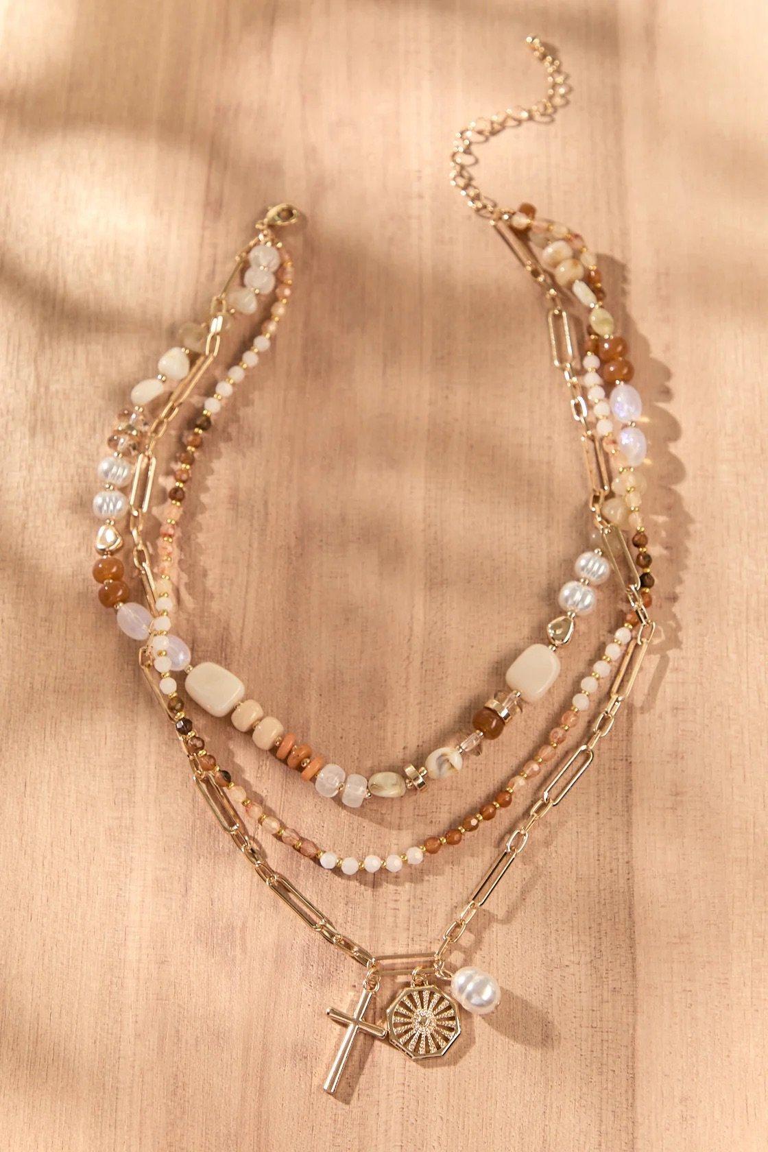  3-layer necklace with pearly beads and brown and orange tones