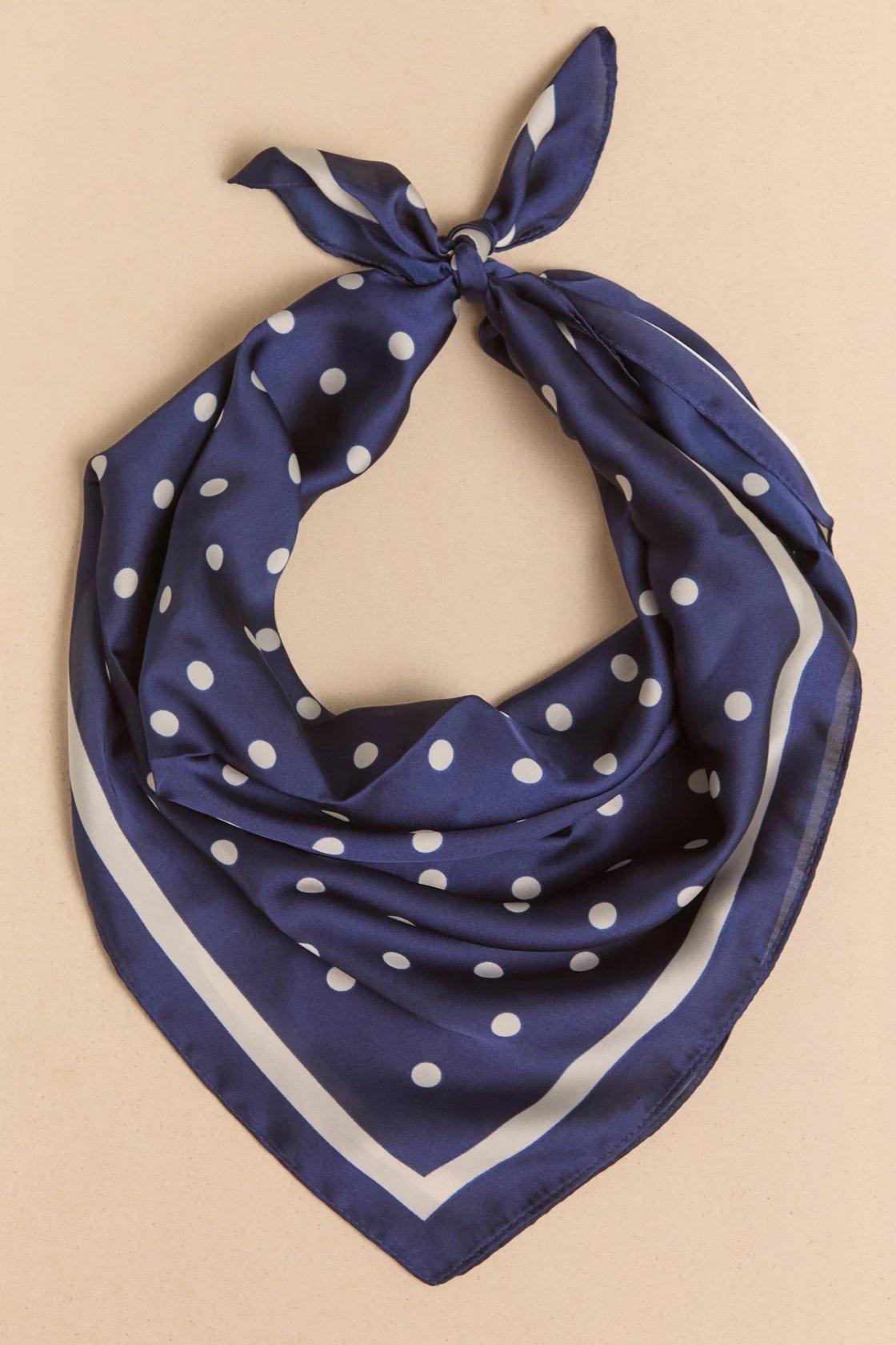navy scarf with white border and polka dots