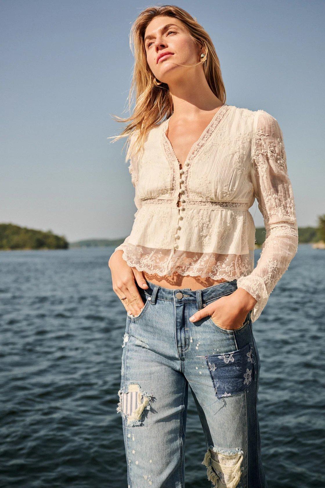 cream colored embroidered babydoll top