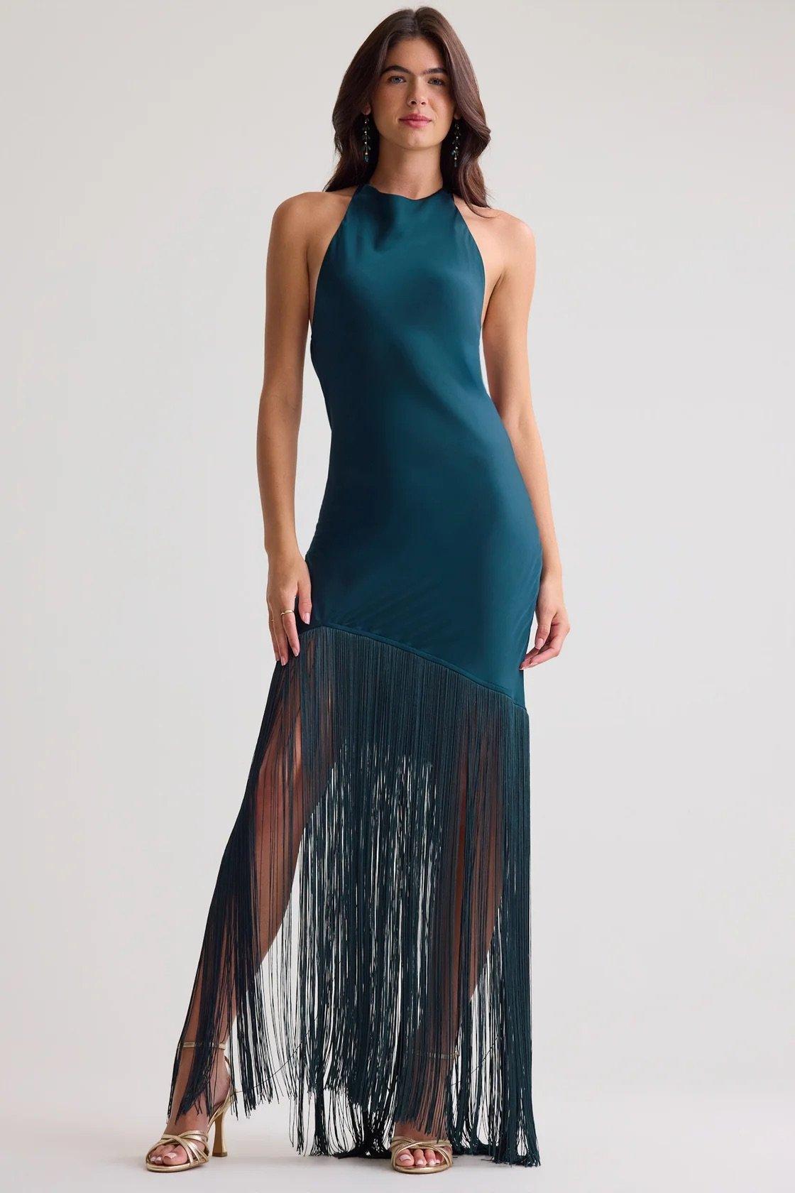 blue-green maxi dress with halterneck and fringe bottom hald