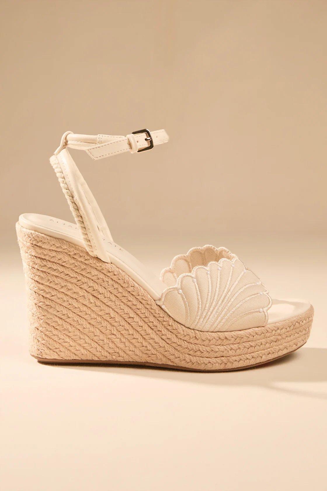 off white and woven shell wedges