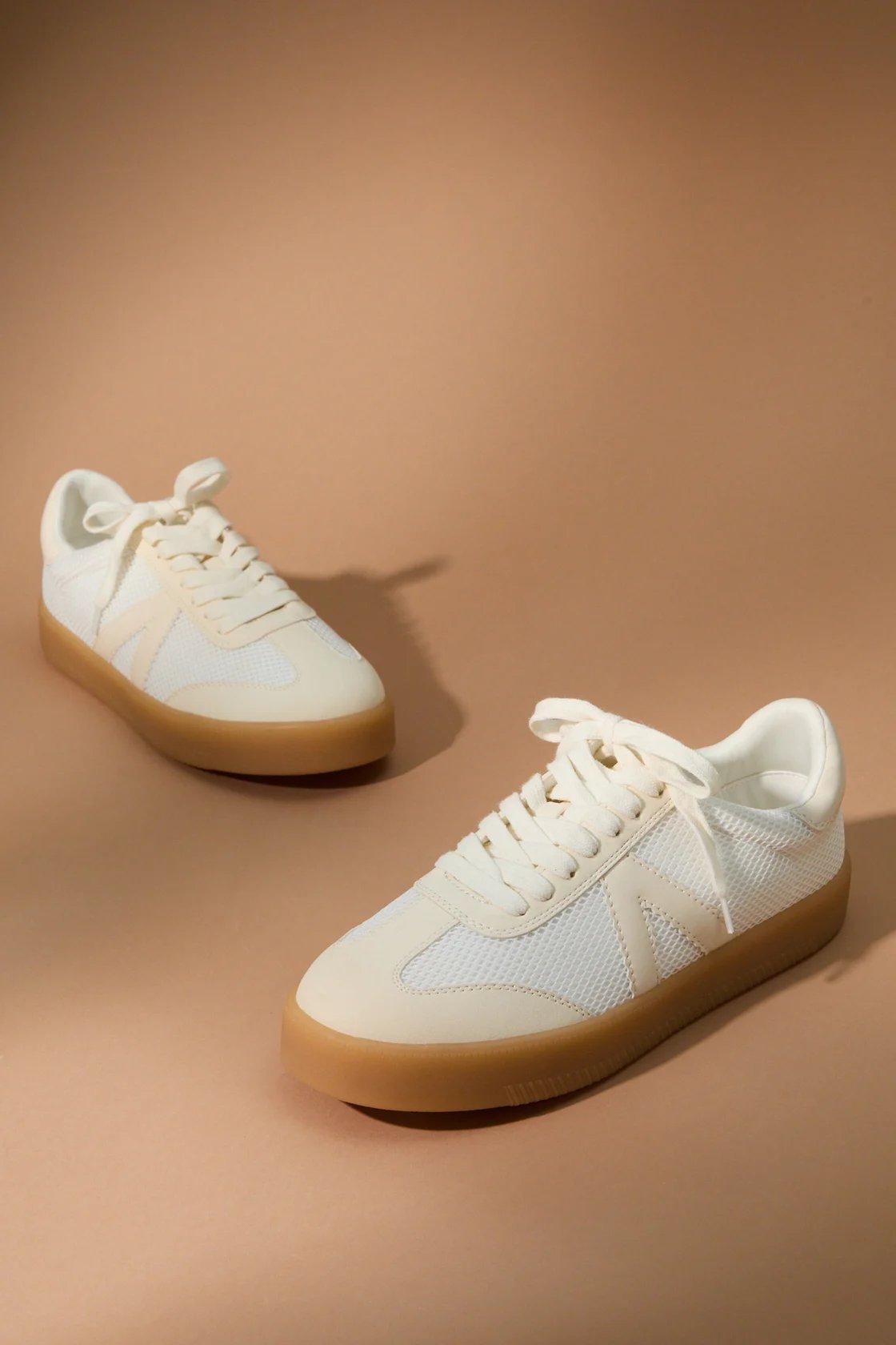 white sneakers with cream detailing