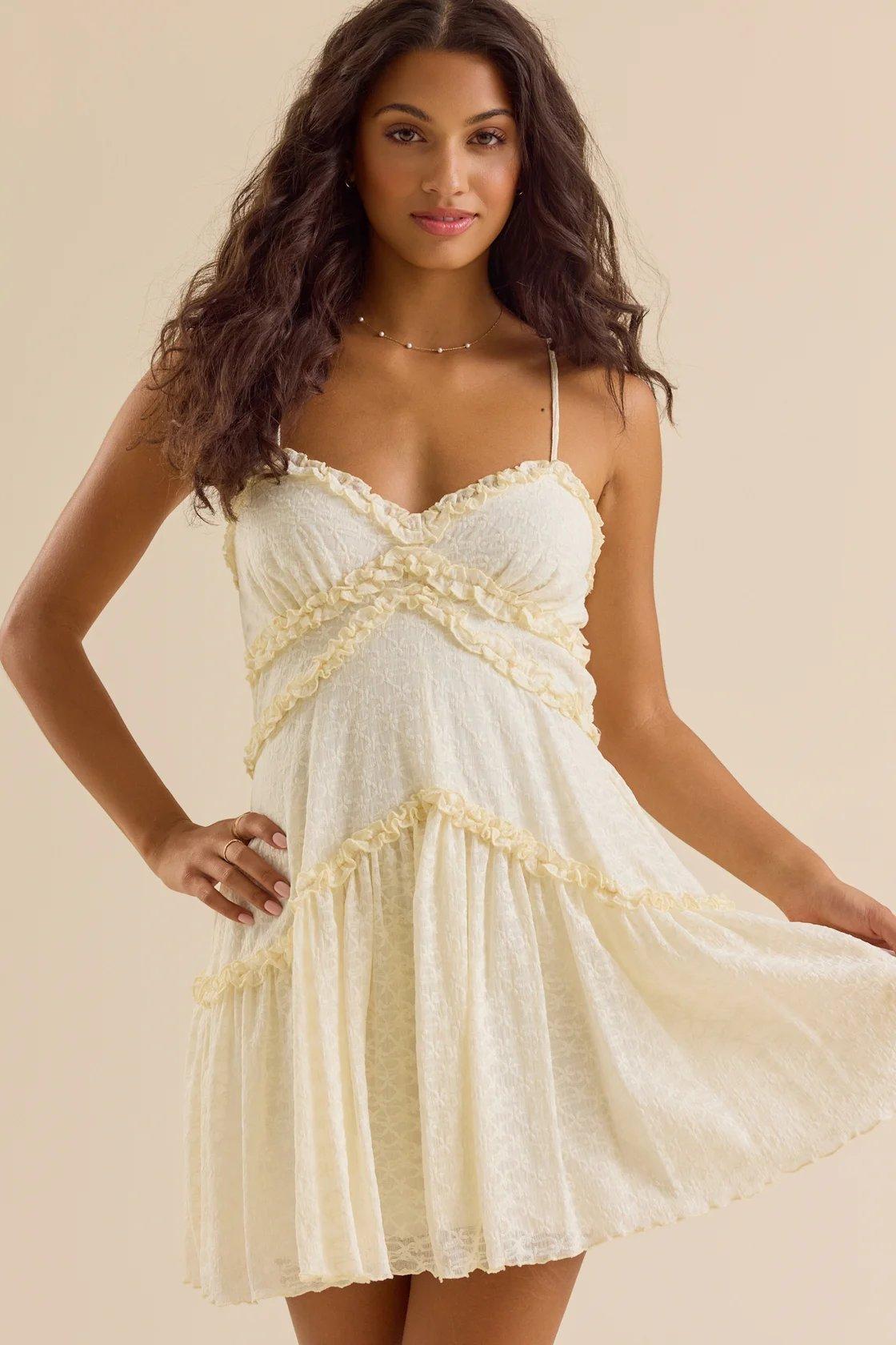 pastel yellow flowy mini dress