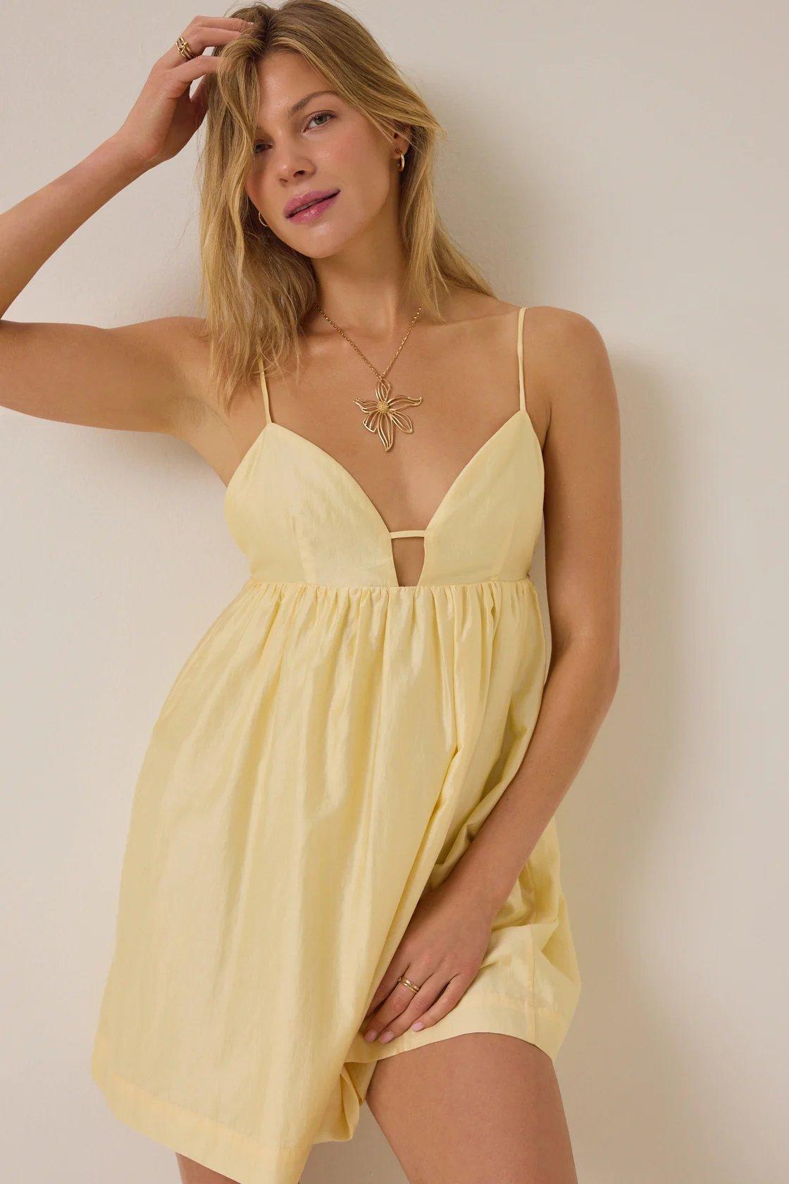 yellow sleeveless mini dress