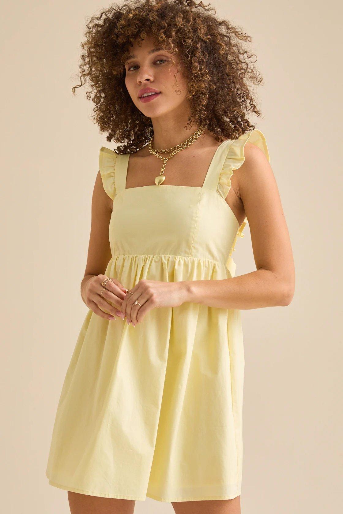 Light yellow mini dress with ruffle sleeves