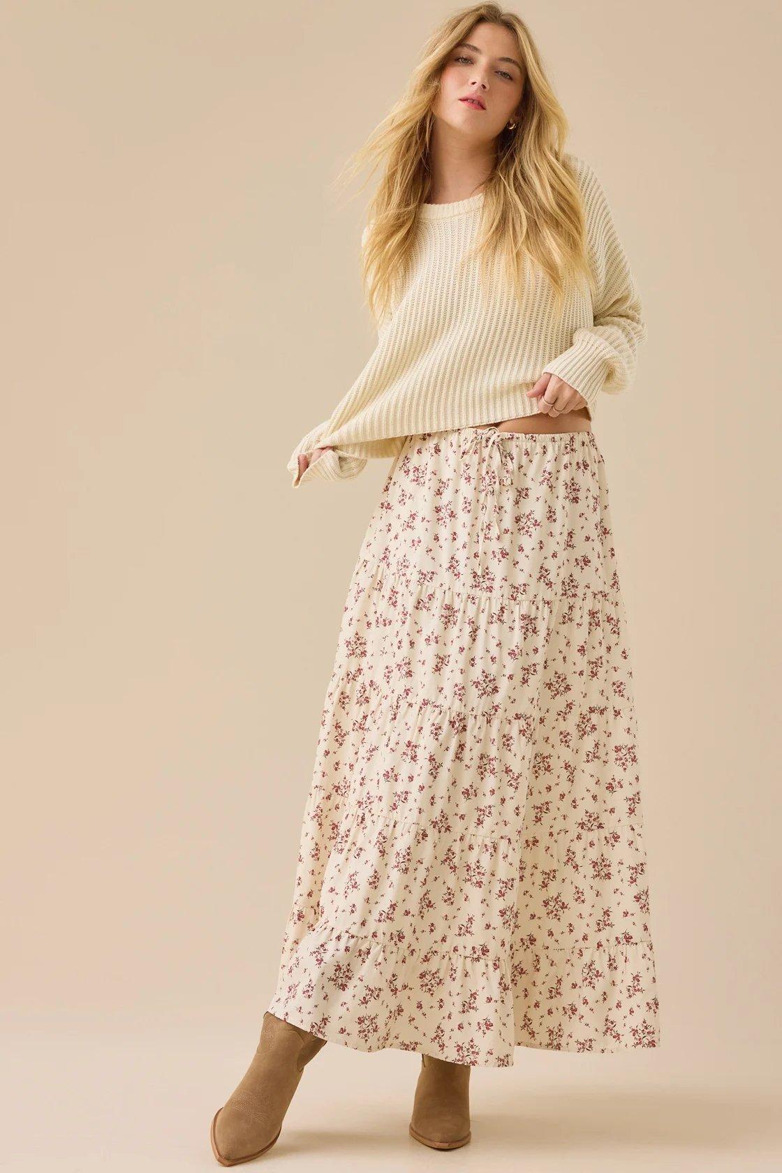 cream colored floral midi skirt with a tie waist