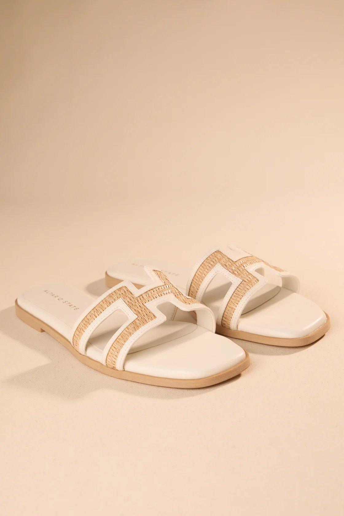 white and tan sandals