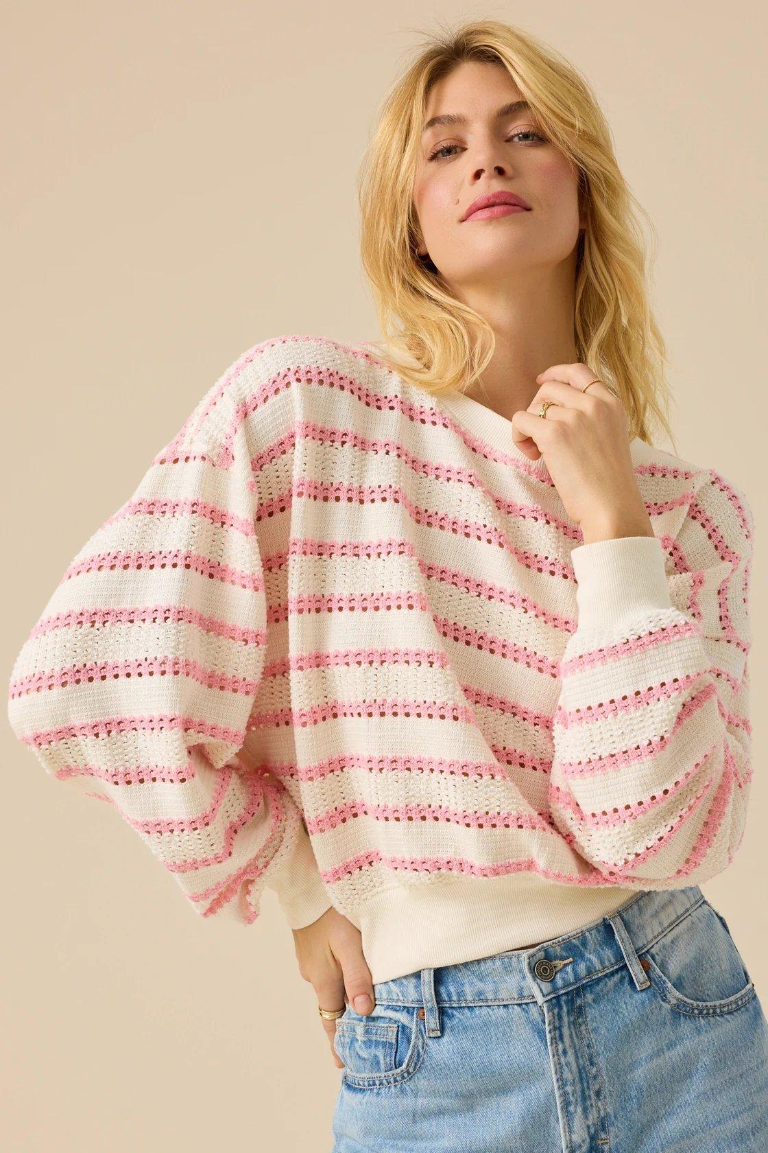 white and pink long sleeve striped top