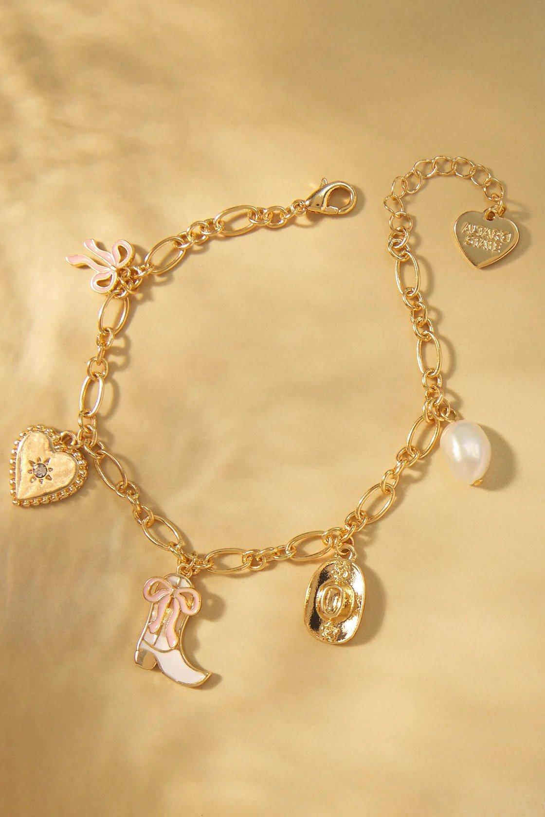 gold-white coquette style cowgirl charm bracelet