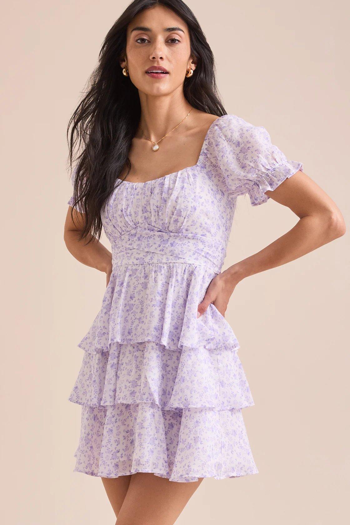 Ivory layered mini dress with lilac colored flowers