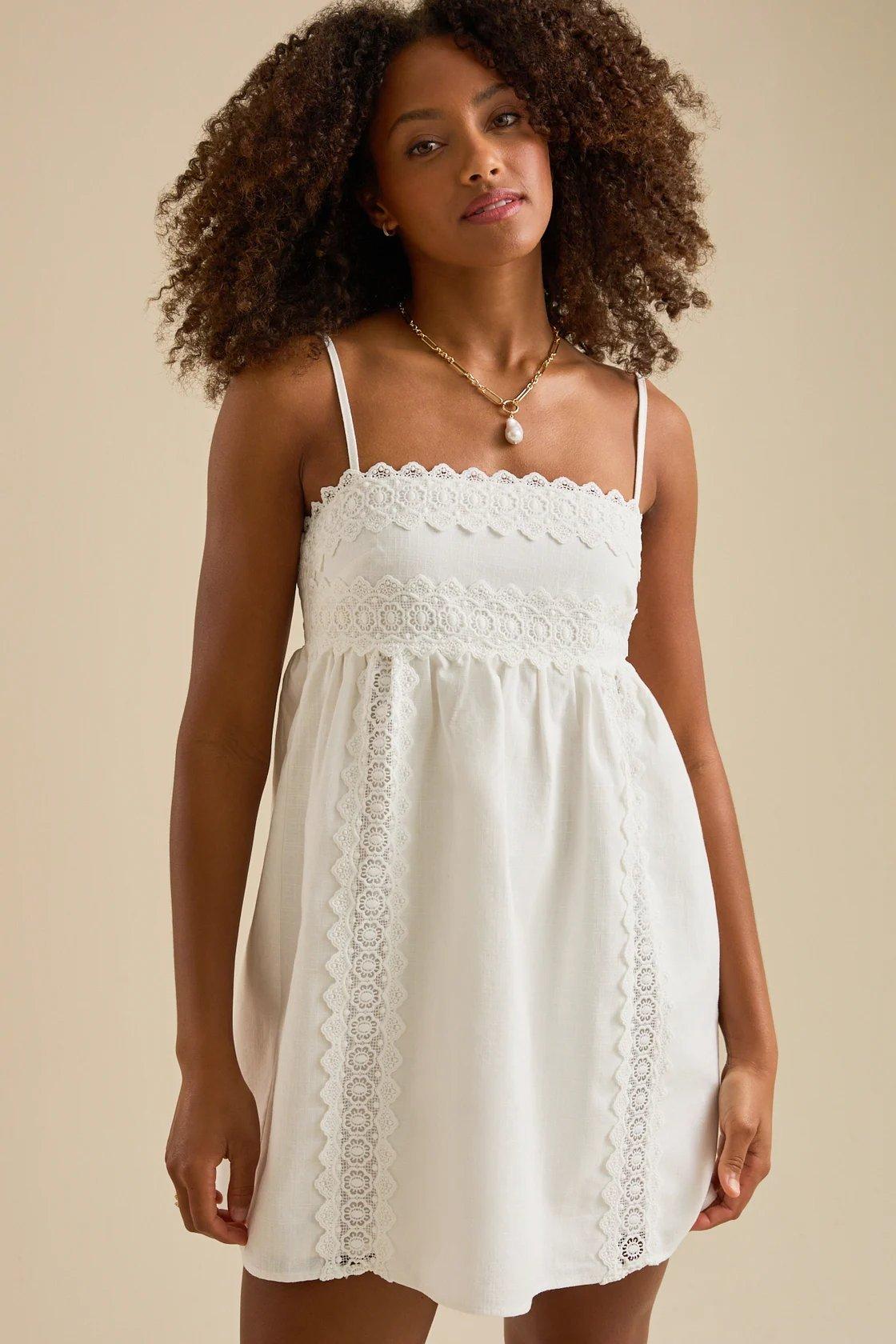 white mini dress with crocheted detailing
