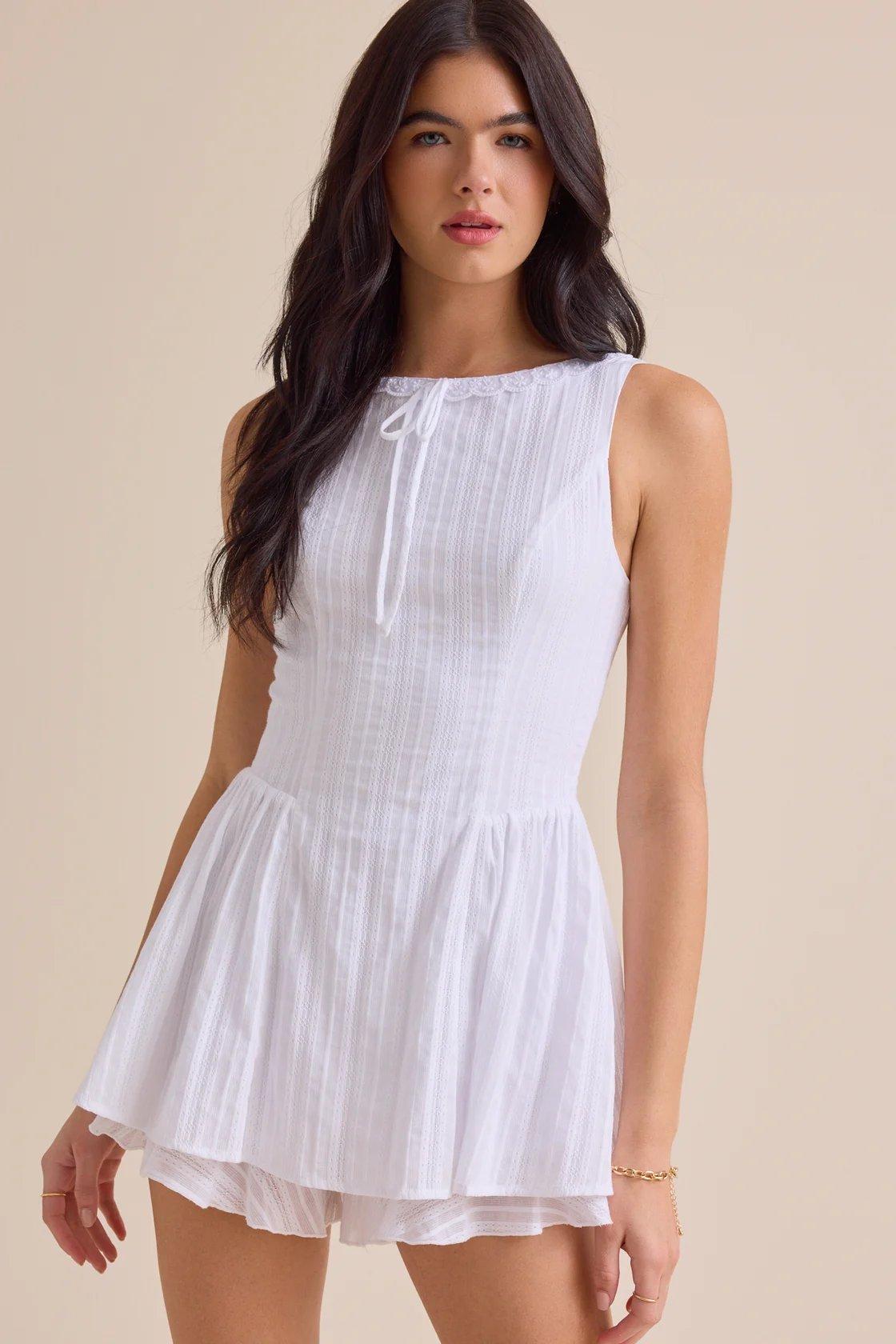 white sleeveless romper