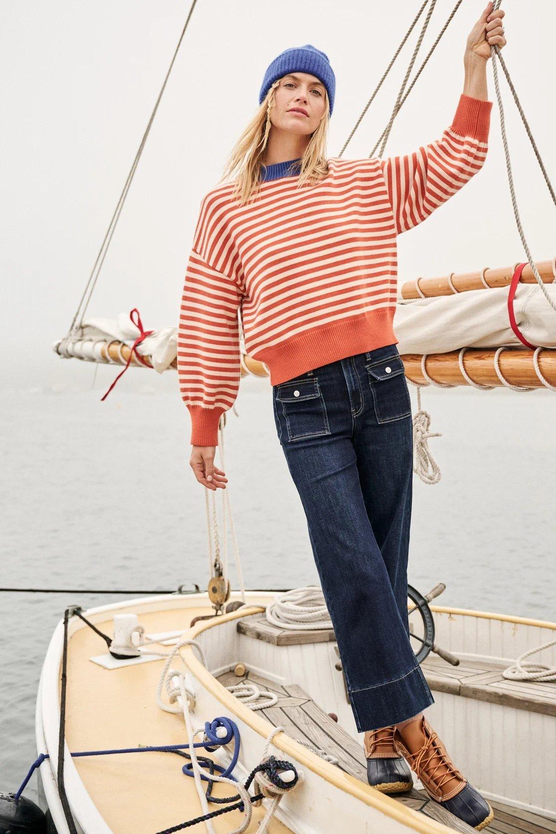 white and rust orange striped sweater