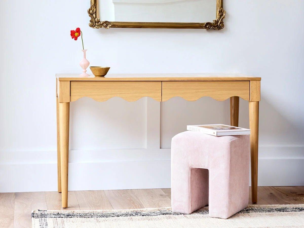 Pale pink upholstered stool