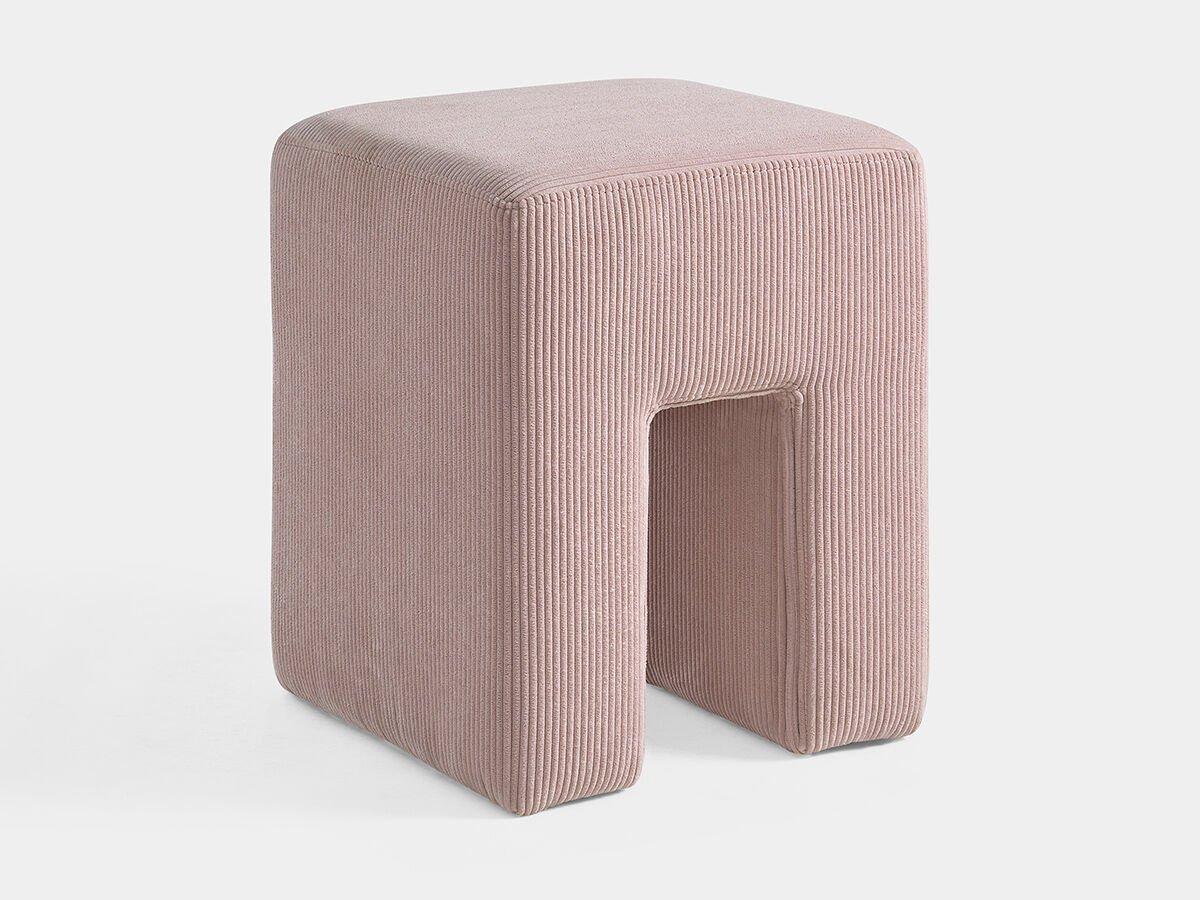 Pale pink upholstered stool