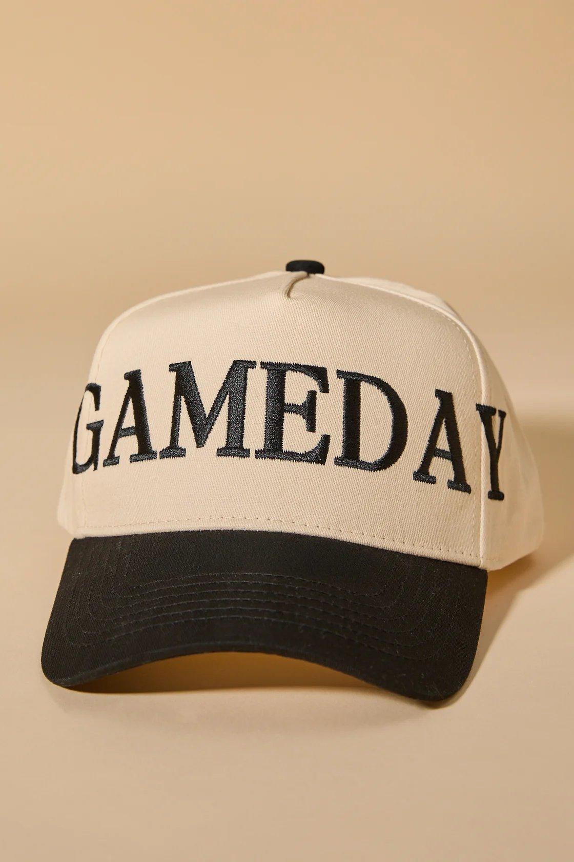 black and white trucker hat with "gameday" copy on the front