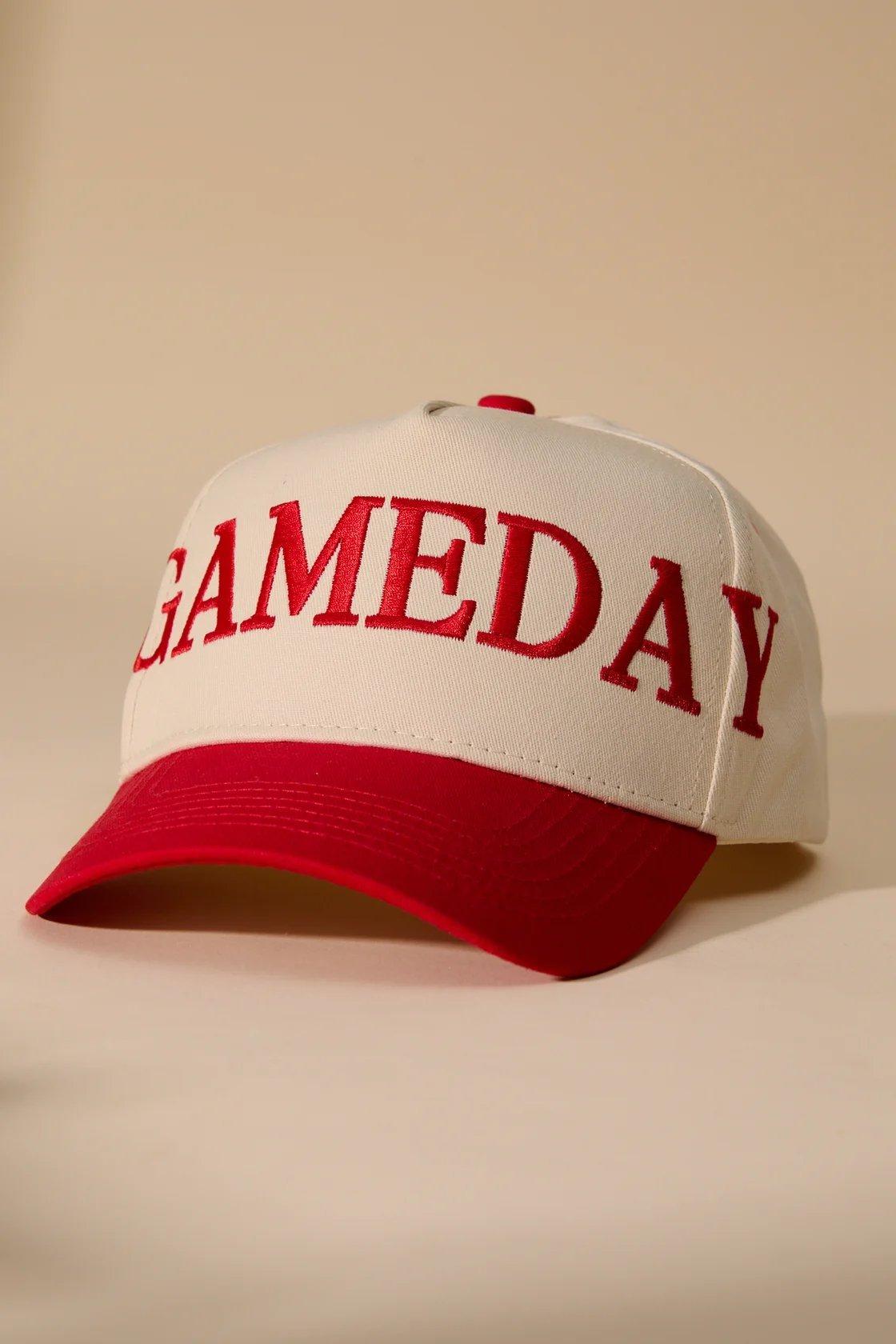 red and white tracker hat with "gameday" copy on the front