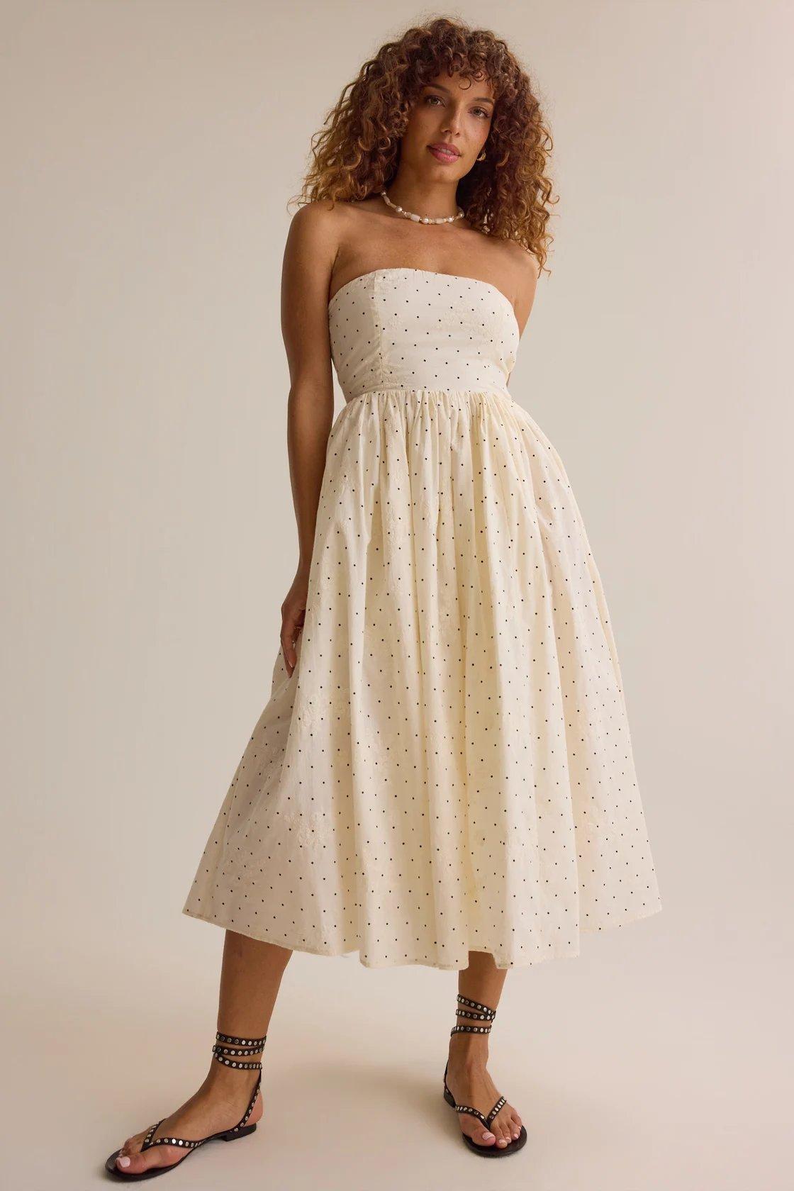cream strapless midi dress with mini black polka dots