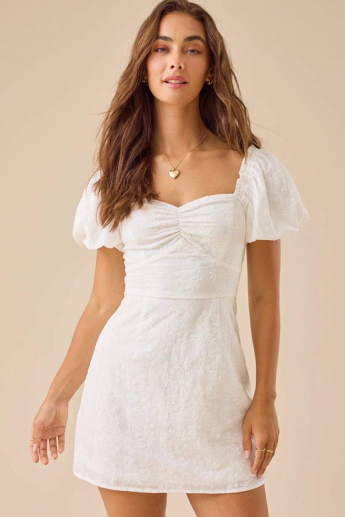 white mini dress with puff sleeves