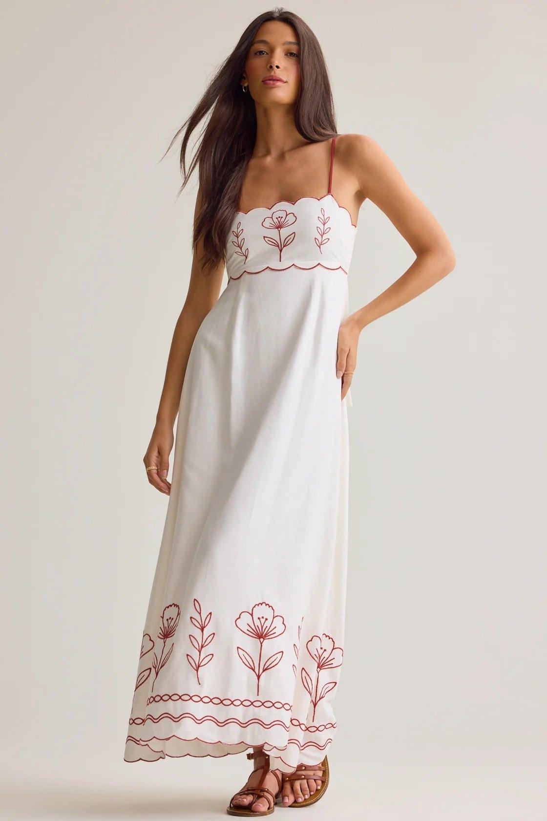 white maxi dress with red embroidered florals