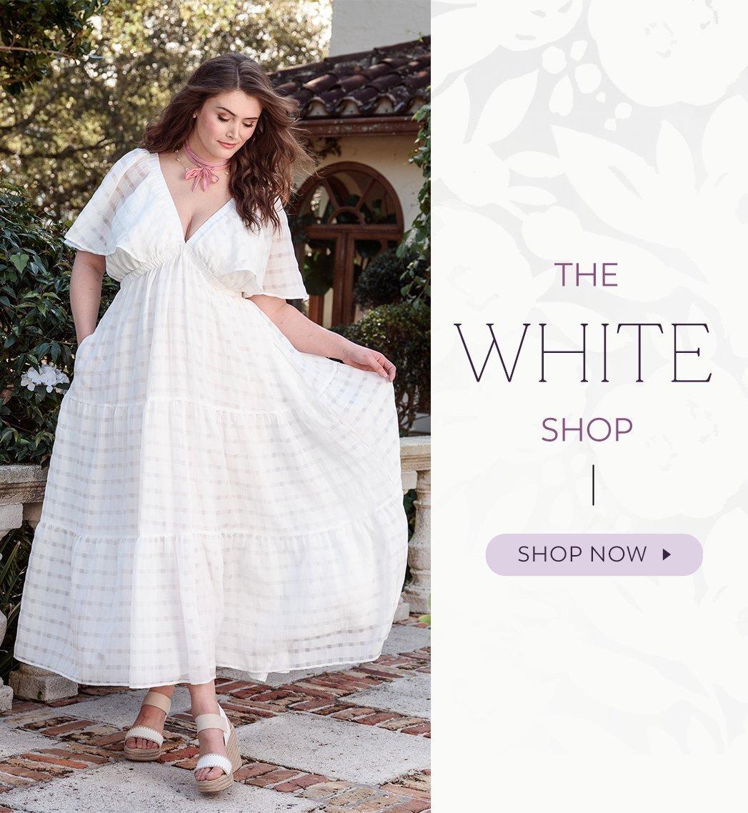 Woman wearing a white maxi dress