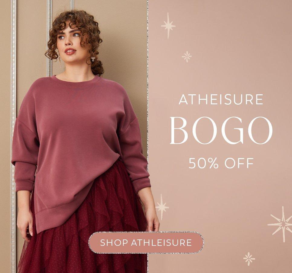 Woman wearing cranberry sweater with maroon tulle skirt