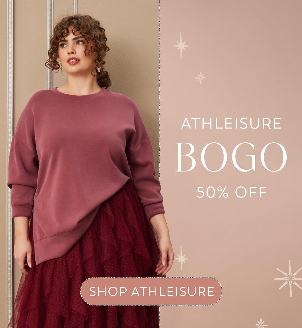 Woman wearing cranberry sweater with maroon tulle skirt
