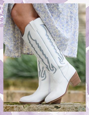 Tall white and blue cowgirl boots