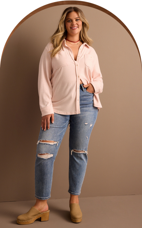 woman wearing a button down shirt and jeans