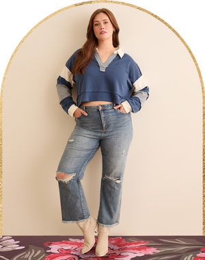 woman wearing ripped loose fitting jeans