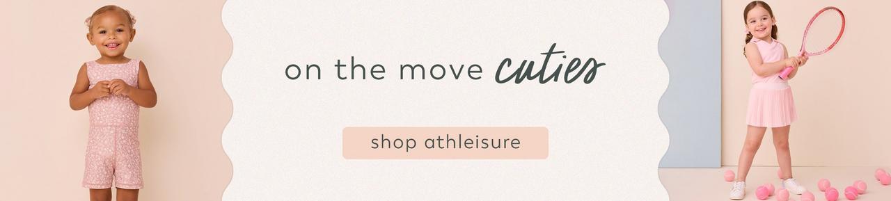 Two little girls wearing pink athleisure