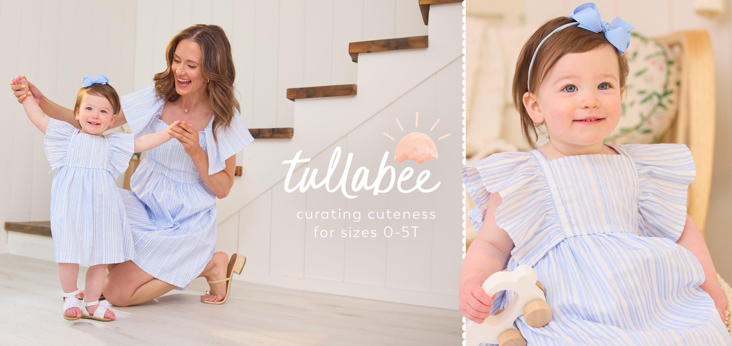 mom and daughter wearing coordinating light blue dresses