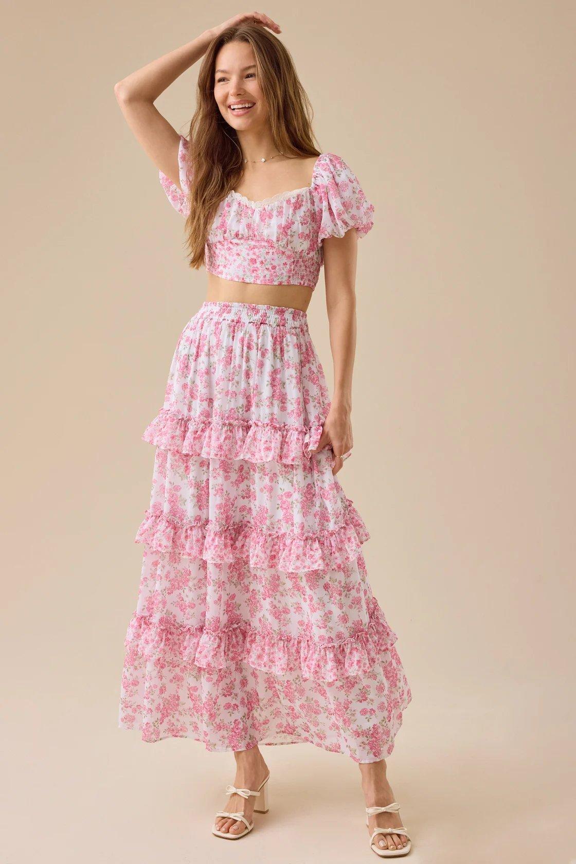 girl wearing an ivory and pink floral maxi skirt
