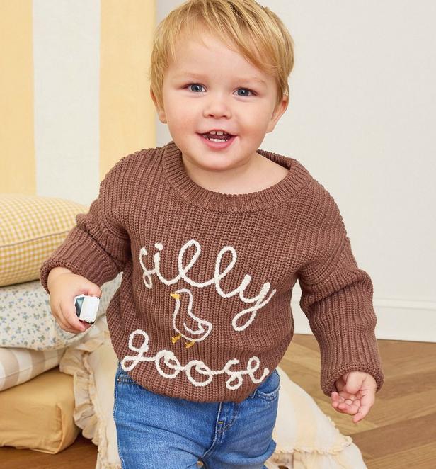 baby boy wearing a plaid button up shirt