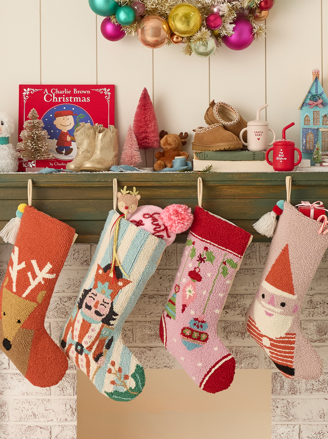 Colorful stockings hung on a mantle.