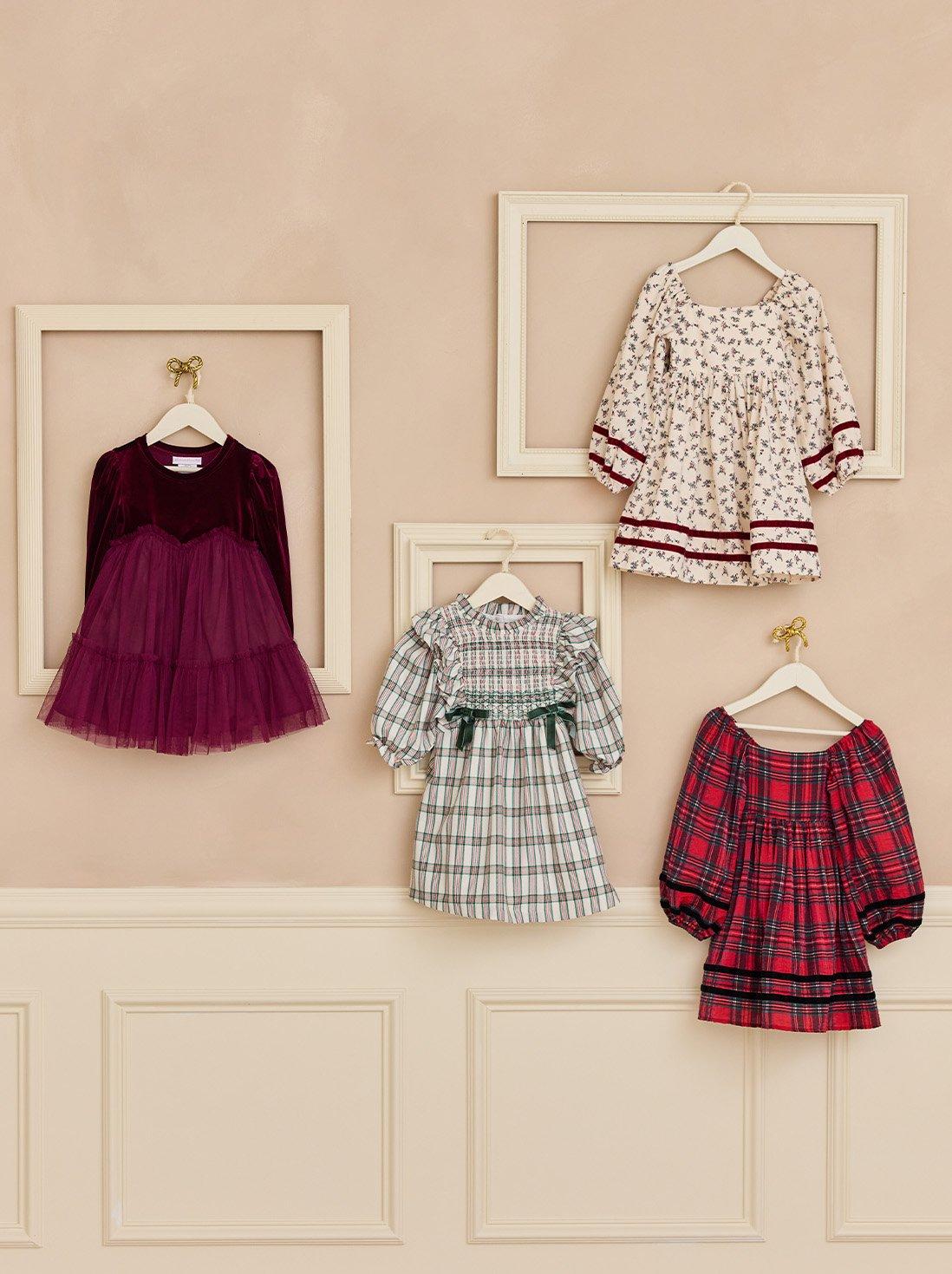 a variety of hanging little girl dresses