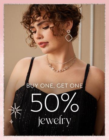 Woman in black dress wearing jewelry