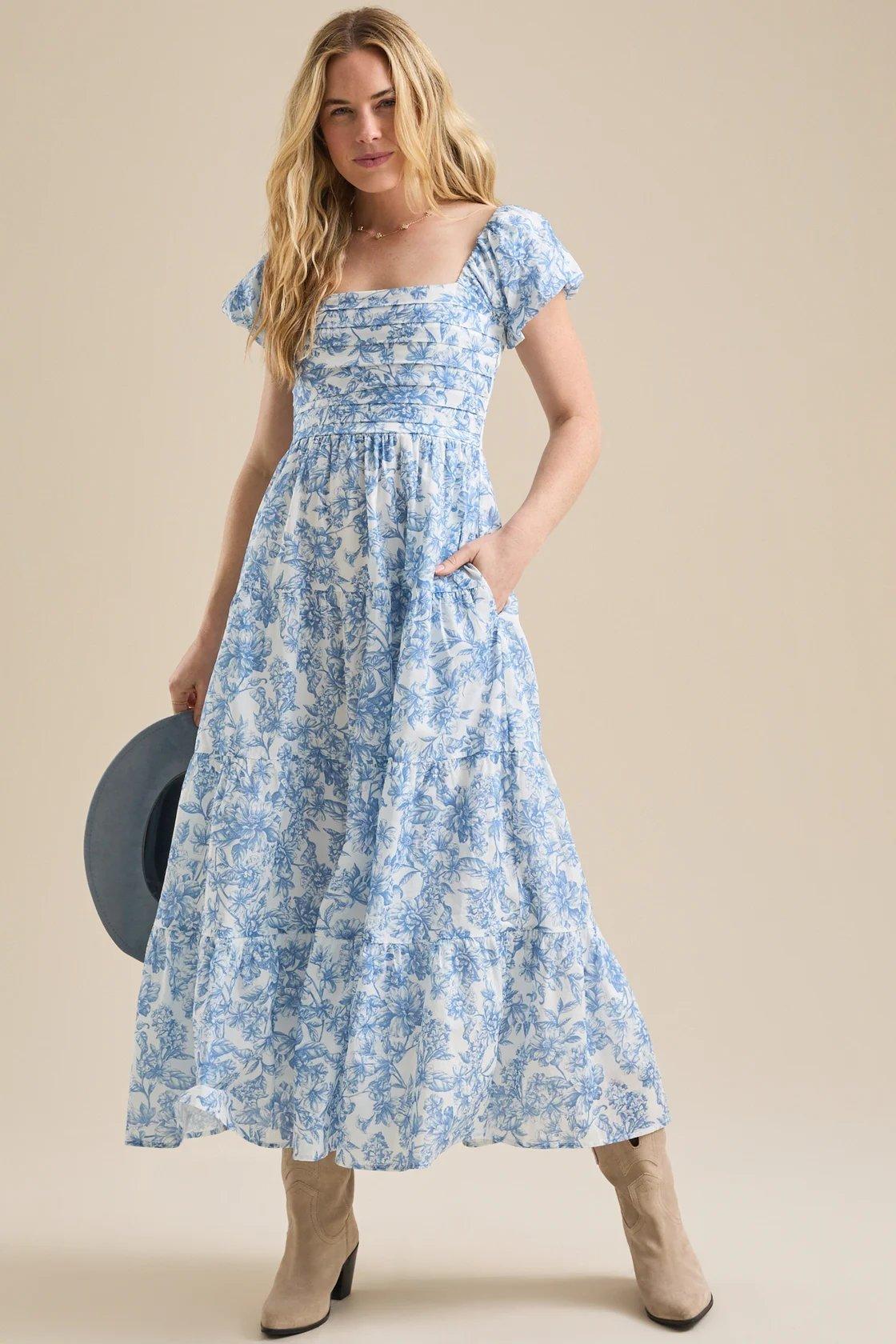 girl wearing floral ivory-blue midi dress