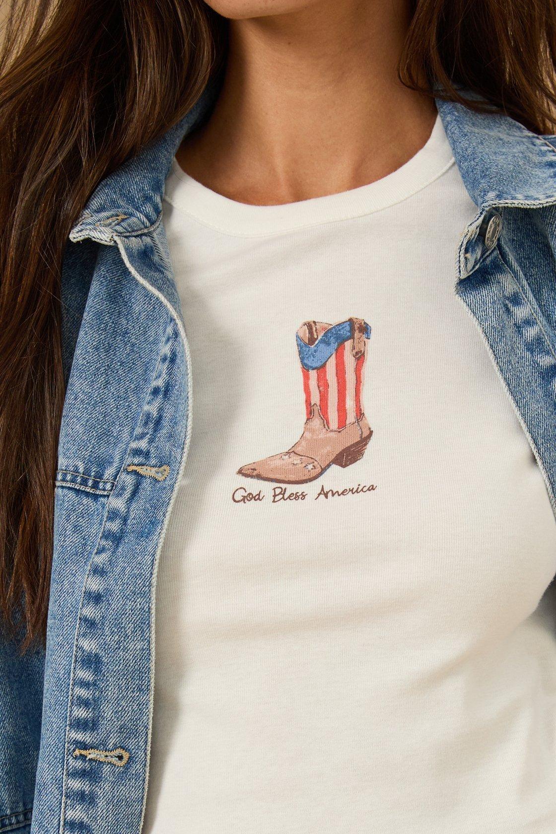 girl wearing an American flag graphic t-shirt